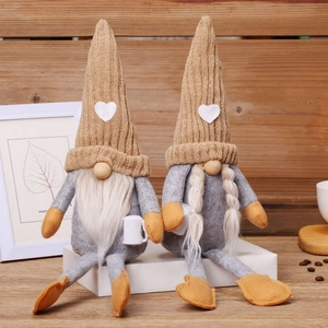 Plush Christmas gnomes in beige and orange, festive Rudolph decorations for coffee nooks
