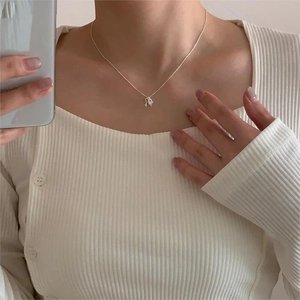 Elegant 925 sterling silver necklace featuring a delicate zircon heart key pendant