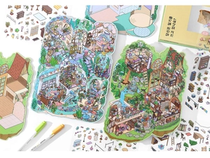 Macro shot of 2.5D building stickers with stationery and pens for DIY journaling