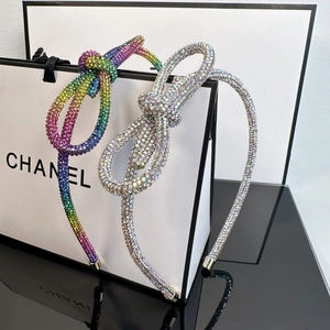 Detail of premium knotted headband with rainbow and silver rhinestone embellishments
