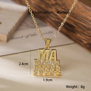 Close-up of gold MAMA necklace with zircon inlay detailing size parameters 45+5cm