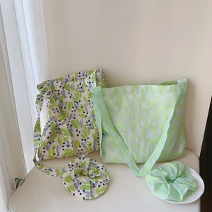 Floral print cotton tote bag with matching scrunchie set in soft natural textures