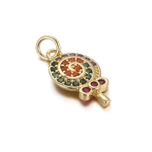 Detail of 18K gold lollipop pendant with colorful gemstones and red spiral pattern