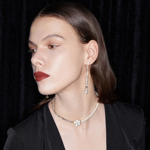 Elegant camellia necklace and long tassel earrings set with pearls and crystals