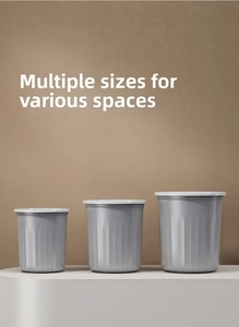 Three sizes of dark grey minimalist waste bins with vertical stripes for home and office