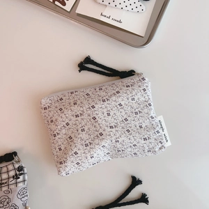 Floral cotton pouch with zipper closure, purple flower print and decorative black tassel