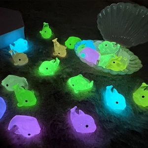 Luminous dolphin resin figurines in assorted glow colors for home and car desktop decor