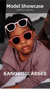 Close-up of pink and orange round polarized sunglasses worn by a child model