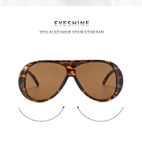 Detail of EYESHINE oversized tortoiseshell frame cycling sunglasses with brown lenses