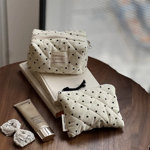 Quilted corduroy makeup bag set with black heart prints on cream white fabric