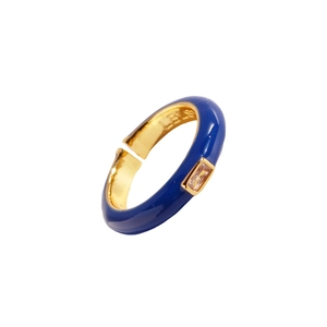 Blue enamel ring with gold metal interior and square cubic zirconia in minimalist style
