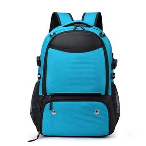 Close-up of blue water-resistant fabric with honeycomb texture and metal air vents on bag