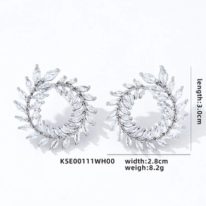 Detailed view showing dimensions of silver wheat leaf earrings with marquise-cut zircons