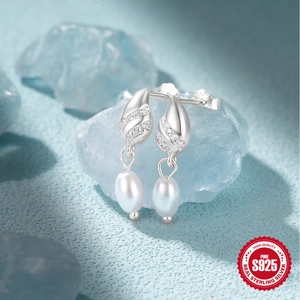 925 sterling silver drop earrings with white pearls and small diamonds on blue mineral stone