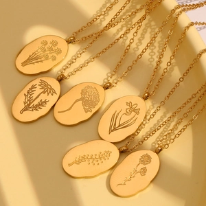 Elegant gold oval flower pendant necklaces with etched floral designs for women