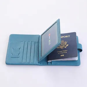 Blue leather RFID passport holder with multiple SIM card slots and travel document organizers