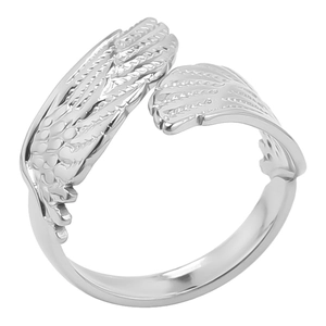 Macro shot of silver wing design details on an adjustable stainless steel ring