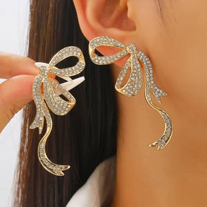 Pendientes de lazo dorado exagerado con brillantes diamantes de imitación blancos
