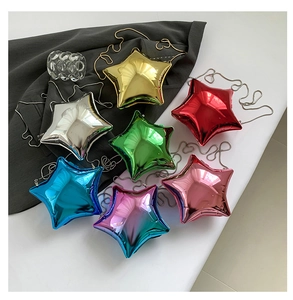 Overhead view of colorful star-shaped acrylic evening bags with metallic finish and chains