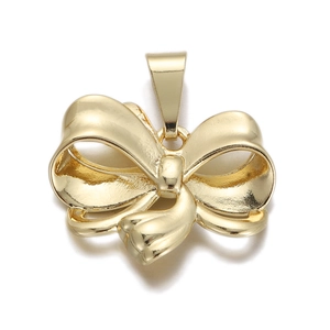 Close-up of a polished gold-plated bow pendant for DIY jewelry making and necklaces