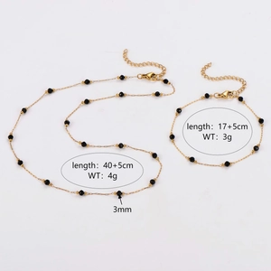 Parure de bijoux minimaliste en acier inoxydable doré avec perles en pierre noire