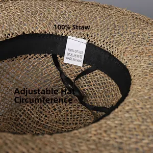 Detail view of woven straw hat interior with 100% natural grass and adjustable sweatband