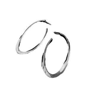 Minimalist silver oval hoop earrings with a stylish irregular twisted metal design for women