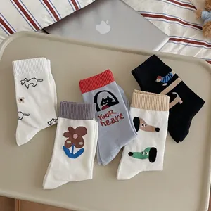 Set of five cotton crew socks with cute cartoon dog and floral patterns for women