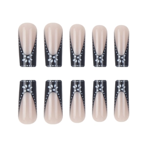 French black and white floral press-on nails with polka dots in long coffin shape