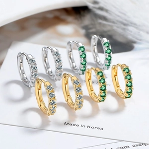Classic hoop earrings with white and green zircons in gold and silver plating