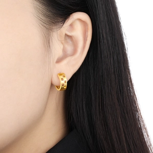 Matte gold hollow square pattern hoop earrings shown on model for a premium look