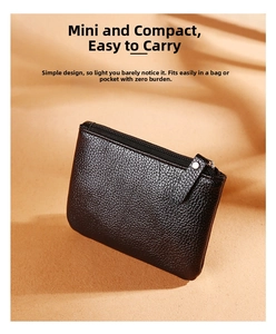 Close-up of a black litchi pattern PU leather coin purse with a sturdy zipper closure