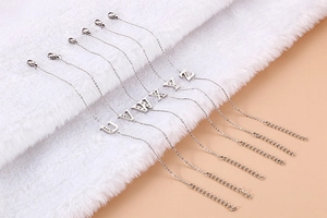 Silver stainless steel initial letter bracelets U-Z with sparkling rhinestones details