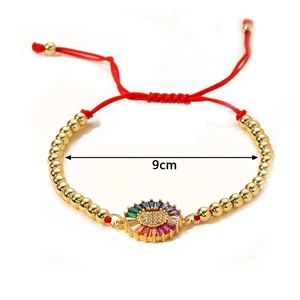 Adjustable gold bead bracelet with rainbow zircon sunflower charm and red braided cord