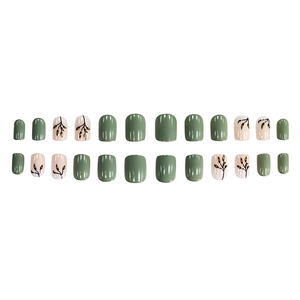Matcha green and cream white press-on nails set with leaf patterns and glossy finish