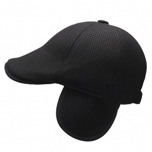 Men's winter flat cap in black knit with ear flaps and warm fleece lining for cold weather