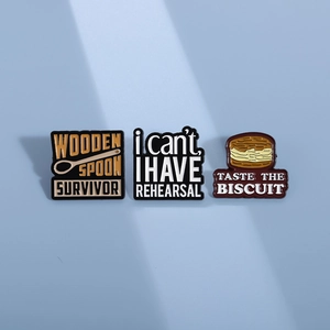 Three creative alloy pins featuring humorous quotes on a minimalist light blue background
