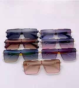 Flat lay of vintage square rimless sunglasses in seven gradient colors with metal bridges