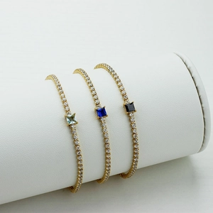 Elegant gold tennis bracelets with light blue, dark blue and black square zircons