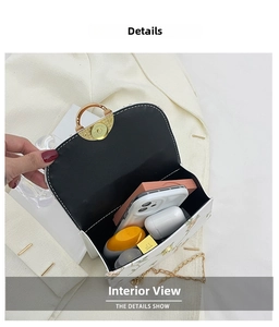 Internal view of a floral mini crossbody bag showing storage space for phone and makeup