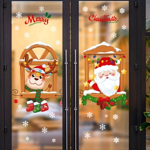 Christmas window stickers featuring cartoon Reindeer and Santa Claus for festive glass decor