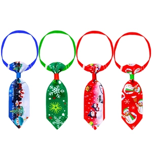 Set of four colorful Christmas ties for pets with adjustable straps and ribbed fabric texture