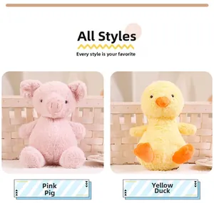 Detail view of plush pink pig and yellow duck stuffed animals in a woven basket