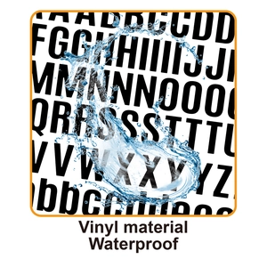 Close-up of waterproof vinyl alphabet stickers showing water resistance with droplets