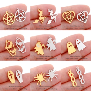 Macro view of Halloween charms in stainless steel with detailed dimensions and weight