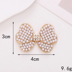 Golden bow jewelry accessory with white pearls and crystals, 4x3cm size for DIY decor