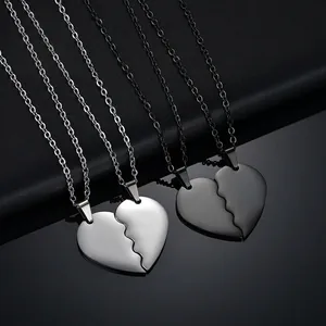 Titanium steel couple necklaces with cracked heart puzzle pendants in silver and black