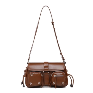 Brown leather baguette bag with multiple utility pockets and silver metal hardware