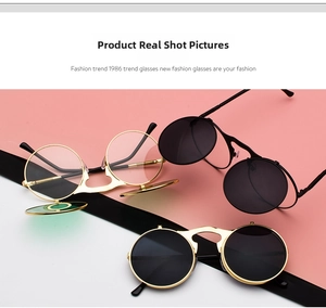 Close-up of retro steampunk flip-up sunglasses with metal round frames and double lenses