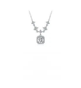 Macro detail of S925 sterling silver square pendant with brilliant moissanite and star accents